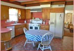 I mean just LOOK at that family kitchen. Do you see that that antique stove?! Be still my heart.